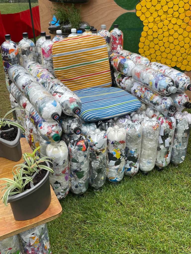 Chunky seat made out of plastic bottles, filled with waste