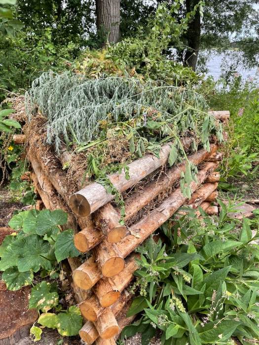 Wood stack compost sculpture
